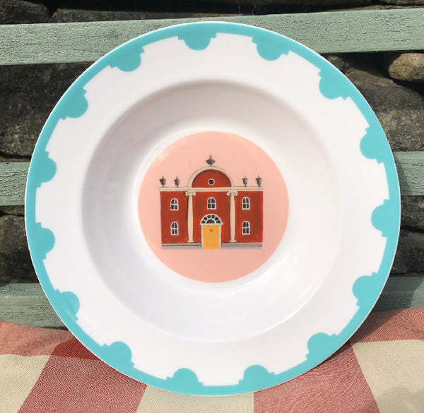 Blue bordered fine bone china plate with a folly in the centre