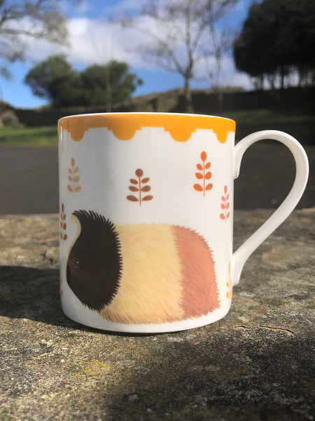 Two-sided fine bone china mug depicting Guinevere the guinea pig on both sides